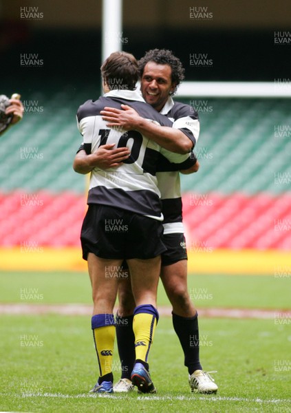 04.06.11 Wales v The Barbarians - DHL Challenge WRU 130th Anniversary Match - Barbarians' match winner Isa Nacewa & Brock James(10) celebrate at the final whistle. 