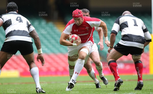 04.06.11 Wales v Barbarians... Alun Wyn Jones takes on Iestyn Thomas of Barbarians and Iosefa Tekori of Barbarians. 