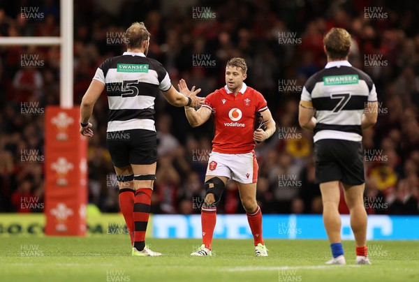 041123 - Wales v Barbarians - Leigh Halfpenny of Wales hugs Alun Wyn Jones of Barbarians as he leaves the field for a final time