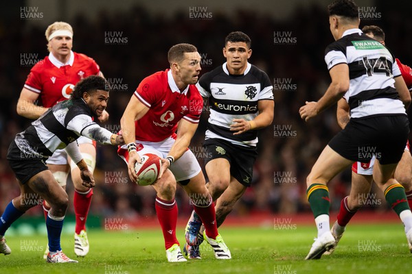 041123 - Wales v Barbarians - George North of Wales is tackled by Simone Kuruvoli  of Barbarians