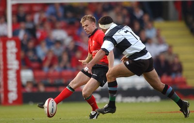 26.05.04  Barbarians v Wales, Bristol  Wales Dwayne Peel kicks past Andre Vos  Huw Evans,Cardiff