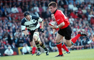 26-05-04. Wales v Barbarians. ASHTON GATE BRISTOL.  Wales' Ceri Sweeney darts through to score try.  