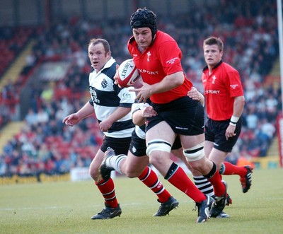 26-05-04. Wales v Barbarians. ASHTON GATE BRISTOL.  Wales' Michael Owen is caught by Matt Burke.  