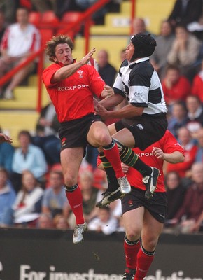 26.05.04  Barbarians v Wales, Bristol  Wales Shane Williams and Bruce Reihana go for high ball  Huw Evans,Cardiff