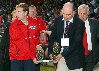 26-05-04. Wales v Barbarians. ASHTON GATE BRISTOL.  Wales' Gareth Thomas is stretchered off the field.  