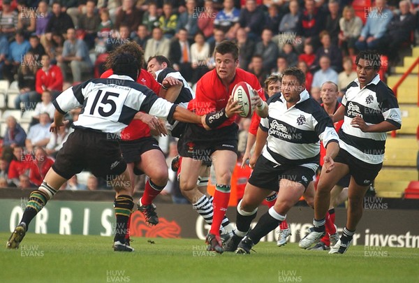 26.05.04  Barbarians v Wales, Bristol  Wales Ceri Sweeney breaks tackle by Bruce Reihana to score try.  Huw Evans,Cardiff