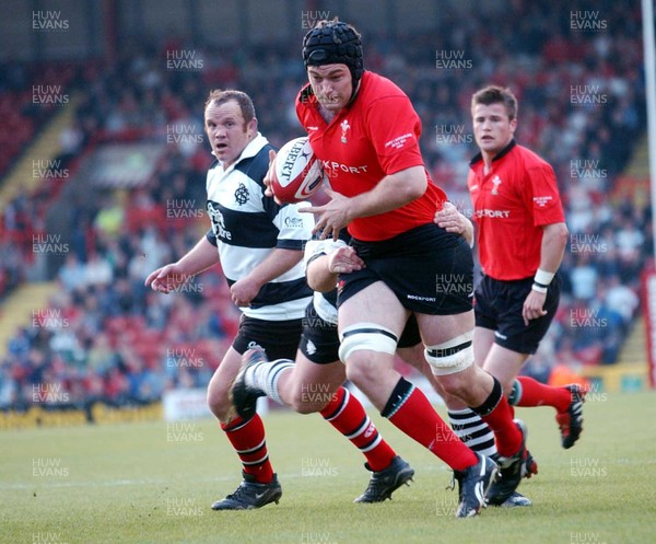 26-05-04. Wales v Barbarians. ASHTON GATE BRISTOL.  Wales' Michael Owen is caught by Matt Burke.  