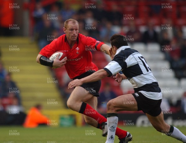 26.05.04  Barbarians v Wales, Bristol  Wales gareth Thomas hands off Damien Traille  Huw Evans,Cardiff