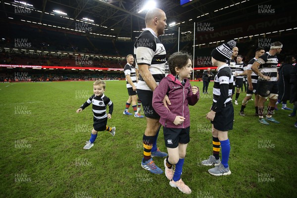 301119 - Wales v Barbarians -  Rory Best's youngest son Richie runs round him on the field