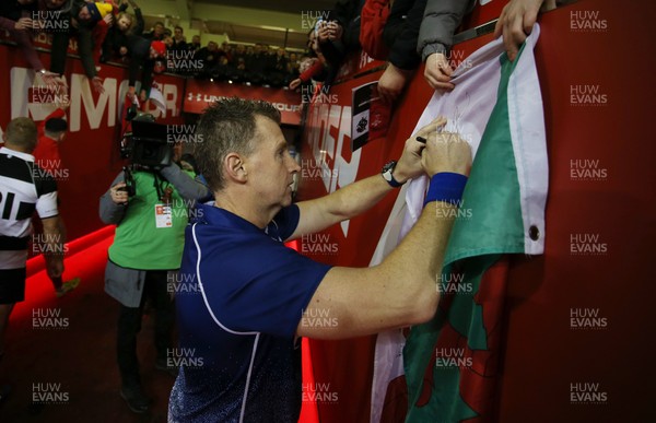 301119 - Wales v Barbarians - Referee Nigel Owens signs autographs in the tunnel