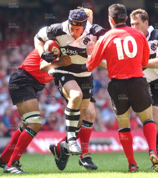 310503 - Wales v Barbarians - Barbarians' Sam Harding charges into the Welsh defence