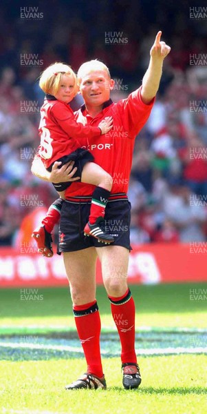 310503 - Wales v Barbarians - Neil Jenkins takes to the field for Wales for the last time with daughter Georgia