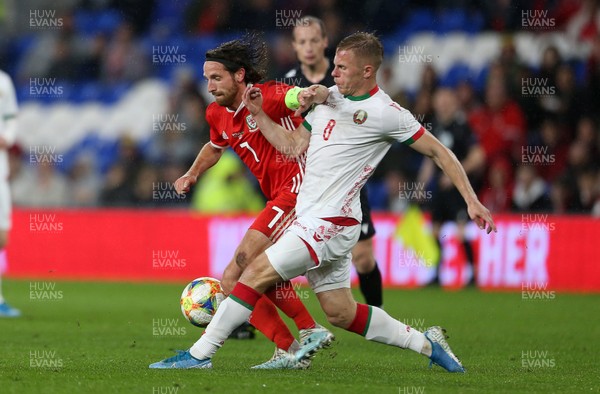 090919 - Wales v Belarus - International Friendly - Joe Allen of Wales is tackled by Nikolai Zolotov of Belarus