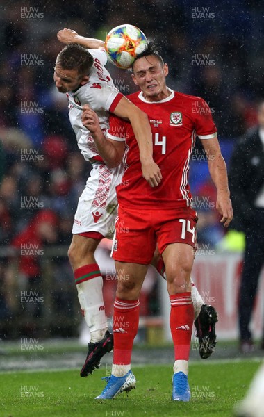 090919 - Wales v Belarus - International Friendly - Ivan Bakhar of Belarus and Connor Roberts of Wales go up for the ball