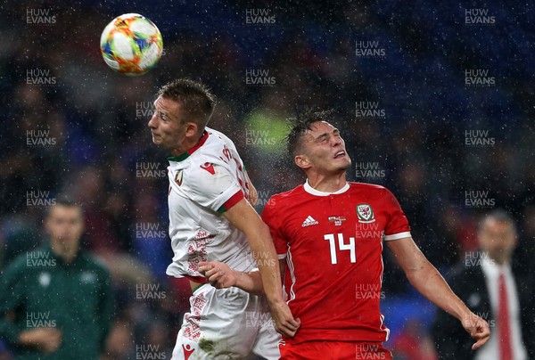 090919 - Wales v Belarus - International Friendly - Ivan Bakhar of Belarus and Connor Roberts of Wales go up for the ball