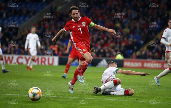 090919 - Wales v Belarus - International Friendly - Joe Allen of Wales is tackled by Denis Polyakov of Belarus