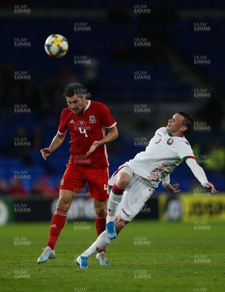 090919 - Wales v Belarus, International Challenge Match - Ben Davies of Wales and Yuri Kovalev of Belarus compete for the ball