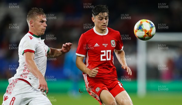 090919 - Wales v Belarus, International Challenge Match - Daniel James of Wales and Nikolai Zolotov of Belarus compete for the ball