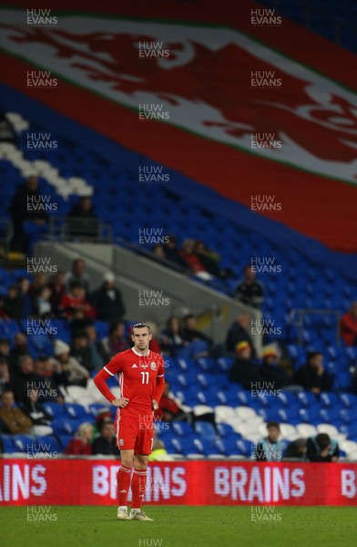 090919 - Wales v Belarus, International Challenge Match - Gareth Bale of Wales infront of the giant Welsh flag that dominated one of the stands