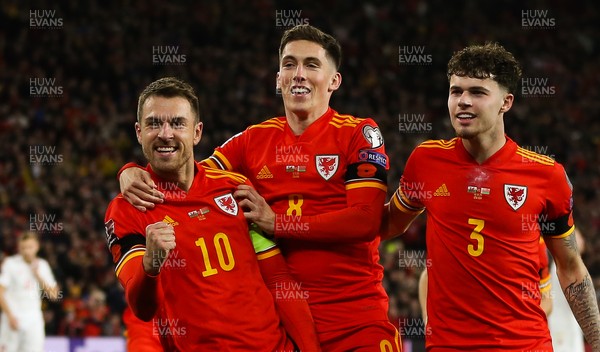 131121 - Wales v Belarus, 2022 World Cup Qualifying Match - Aaron Ramsey of Wales, Harry Wilson of Wales and Neco Williams of Wales after Ramsey scores his second goal
