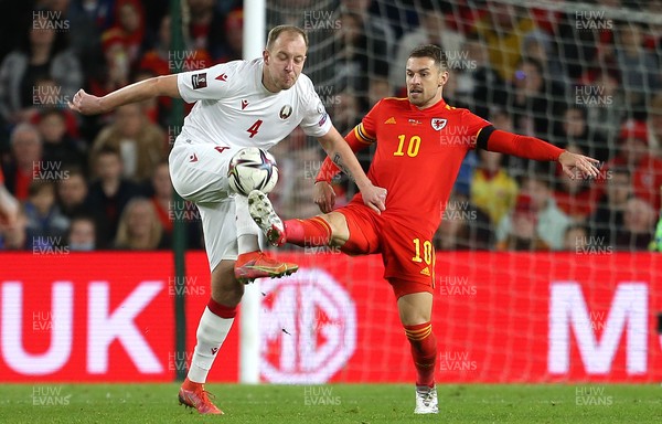 131121 - Wales v Belarus, 2022 World Cup Qualifying Match -  Nikita Naumov of Belarus and Aaron Ramsey of Wales compete
