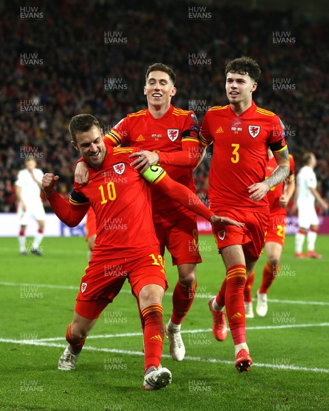 131121 - Wales v Belarus, 2022 World Cup Qualifying Match -  Aaron Ramsey of Wales celebrates his second goal with Harry Wilson (8) and Neco Williams (3)
