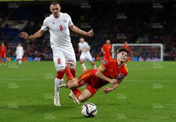 131121 - Wales v Belarus, 2022 World Cup Qualifying Match -  Daniel James of Wales is tackled by Aleksandr Selyava of Belarus
