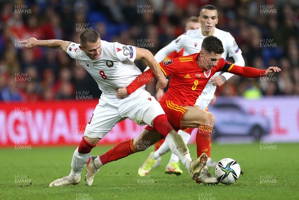 131121 - Wales v Belarus, 2022 World Cup Qualifying Match -  Harry Wilson of Wales is tackled by Aleksandr Selyava of Belarus