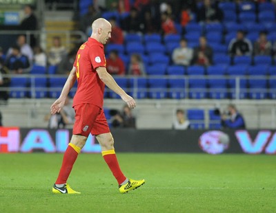 070912 - Wales v Belgium - FIFA 2014 World Cup Qualifying Match -   Wales' James Collins leaves the pitch after his red card 