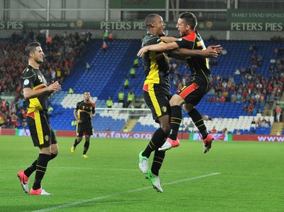 070912 - Wales v Belgium - FIFA 2014 World Cup Qualifying Match -   Belgiums Vincent Kompany, centre, celebrates scoring with Belgium's Dries Mertens 
