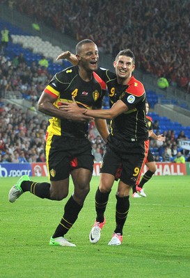 070912 - Wales v Belgium - FIFA 2014 World Cup Qualifying Match -   Belgium's Vincent Kompany, left, celebrates scoring with team mate Kevin Mirallas 