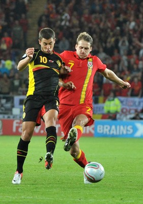070912 - Wales v Belgium - FIFA 2014 World Cup Qualifying Match -    Belgiums' Eden Hazard battles for the ball with Wales' David Edwards 