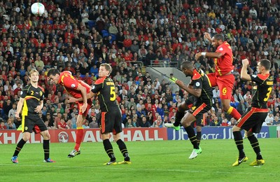 070912 - Wales v Belgium - FIFA 2014 World Cup Qualifying Match -    Wales' Ashley Williams powers a header goal wards 