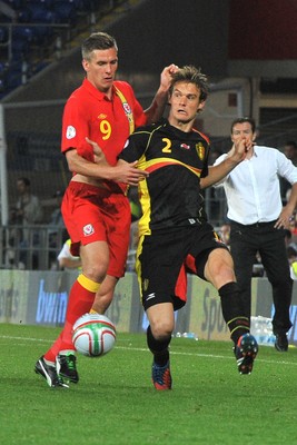 070912 - Wales v Belgium - FIFA 2014 World Cup Qualifying Match -   Wales' Steve Morison battles Belgiums' Guillaume Gillet for the ball  