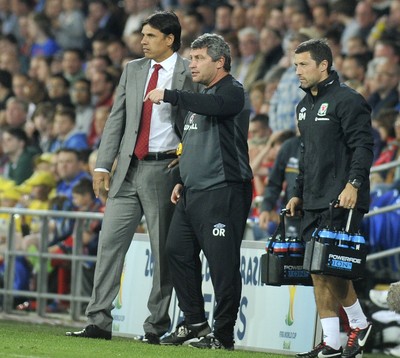070912 - Wales v Belgium - FIFA 2014 World Cup Qualifying Match -    Wales' manager Chris Coleman and assistant manager Oisian Roberts on the touchline 