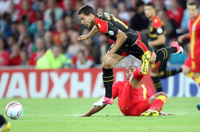 070912 - Wales v Belgium, FIFA 2014 World Cup Qualifying match - Wales' Ashley Williams tackles Belgium's Eden Hazard 
