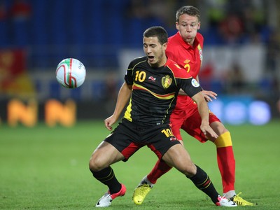 070912 - Wales v Belgium, FIFA 2014 World Cup Qualifying match - Belgium's Eden Hazard holds off Wales' Chris Gunter 