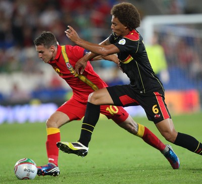 070912 - Wales v Belgium, FIFA 2014 World Cup Qualifying match - Wales' Aaron Ramsey tangles with Belgium's Jan Vertonghen 