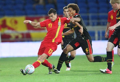 070912 - Wales v Belgium, FIFA 2014 World Cup Qualifying match - Wales' Gareth Bale is challenged by Belgium's Axel Witsel 