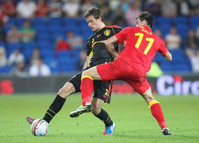 070912 - Wales v Belgium, FIFA 2014 World Cup Qualifying match - Wales' Gareth Bale challenges Belgium's Guillaume Gillet 