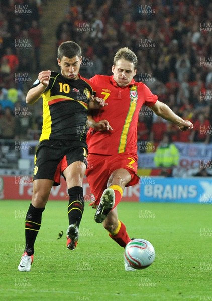 070912 - Wales v Belgium - FIFA 2014 World Cup Qualifying Match -    Belgiums' Eden Hazard battles for the ball with Wales' David Edwards 