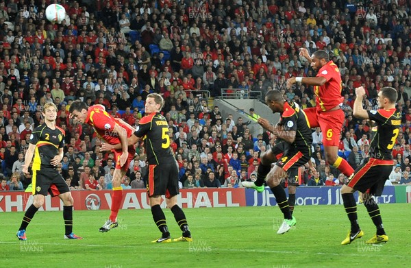 070912 - Wales v Belgium - FIFA 2014 World Cup Qualifying Match -    Wales' Ashley Williams powers a header goal wards 