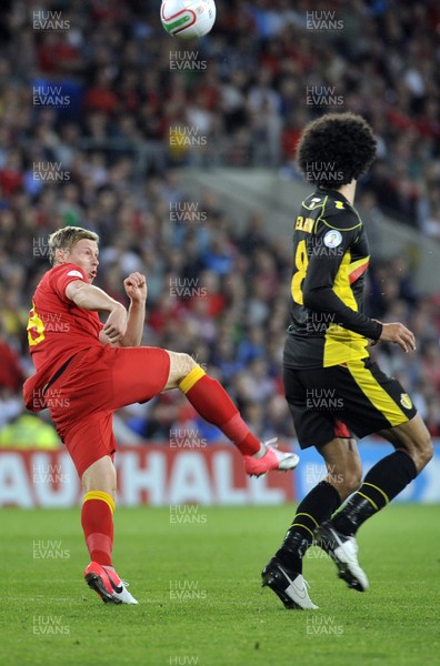 070912 - Wales v Belgium - FIFA 2014 World Cup Qualifying Match -    Wales' Simon Church slices the ball 