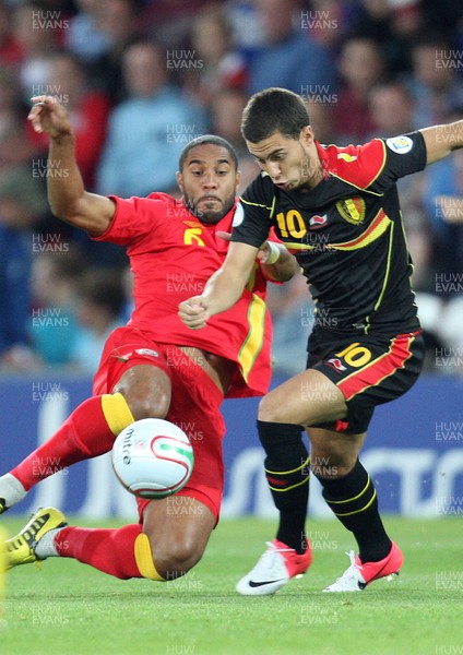 070912 - Wales v Belgium, FIFA 2014 World Cup Qualifying match - Wales' Ashley Williams tackles Belgium's Eden Hazard 