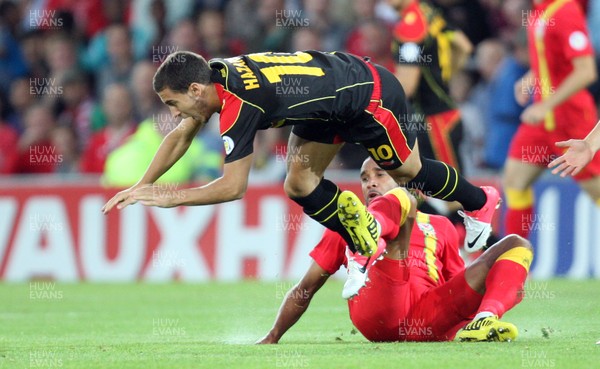 070912 - Wales v Belgium, FIFA 2014 World Cup Qualifying match - Wales' Ashley Williams tackles Belgium's Eden Hazard 