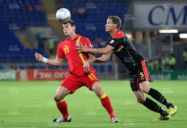 070912 - Wales v Belgium, FIFA 2014 World Cup Qualifying match - \Wales' Gareth Bale beats Belgium's Jan Vertonghen to the ball