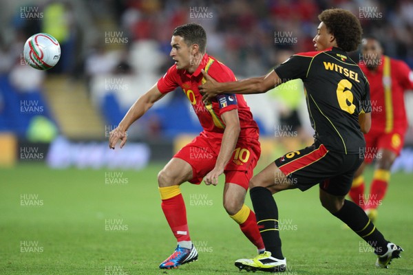 070912 - Wales v Belgium, FIFA 2014 World Cup Qualifying match - Wales' Aaron Ramsey holds off Belgium's Axel Witsel 