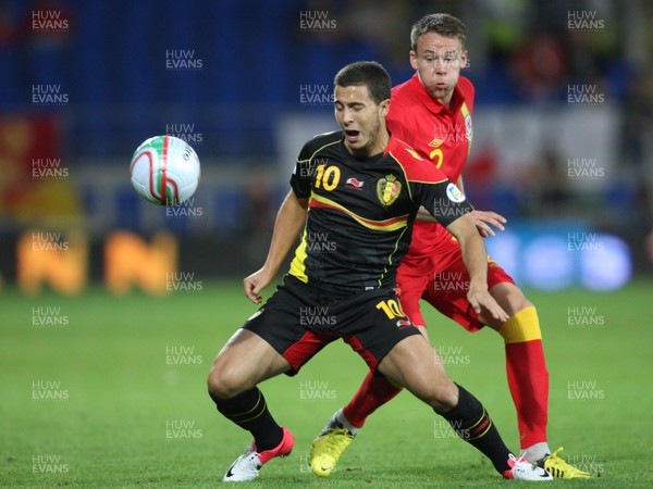 070912 - Wales v Belgium, FIFA 2014 World Cup Qualifying match - Belgium's Eden Hazard holds off Wales' Chris Gunter 