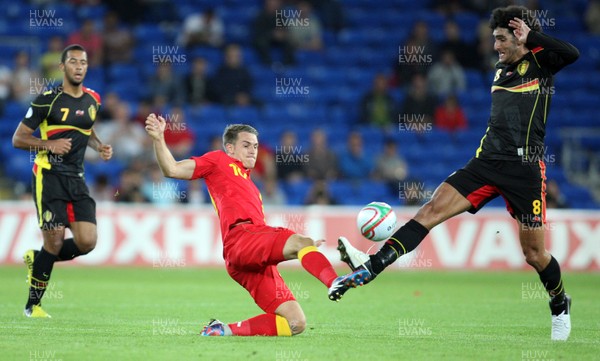 070912 - Wales v Belgium, FIFA 2014 World Cup Qualifying match - Wales' Aaron Ramsey and Belgium's Marouane Fellaini compete for the ball