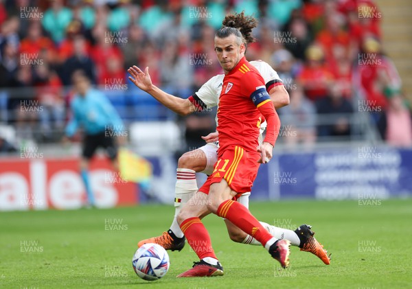 110622 - Wales v Belgium, UEFA Nations League - Gareth Bale of Wales gets a shot at goal as Arthur Theate of Belgium challenges